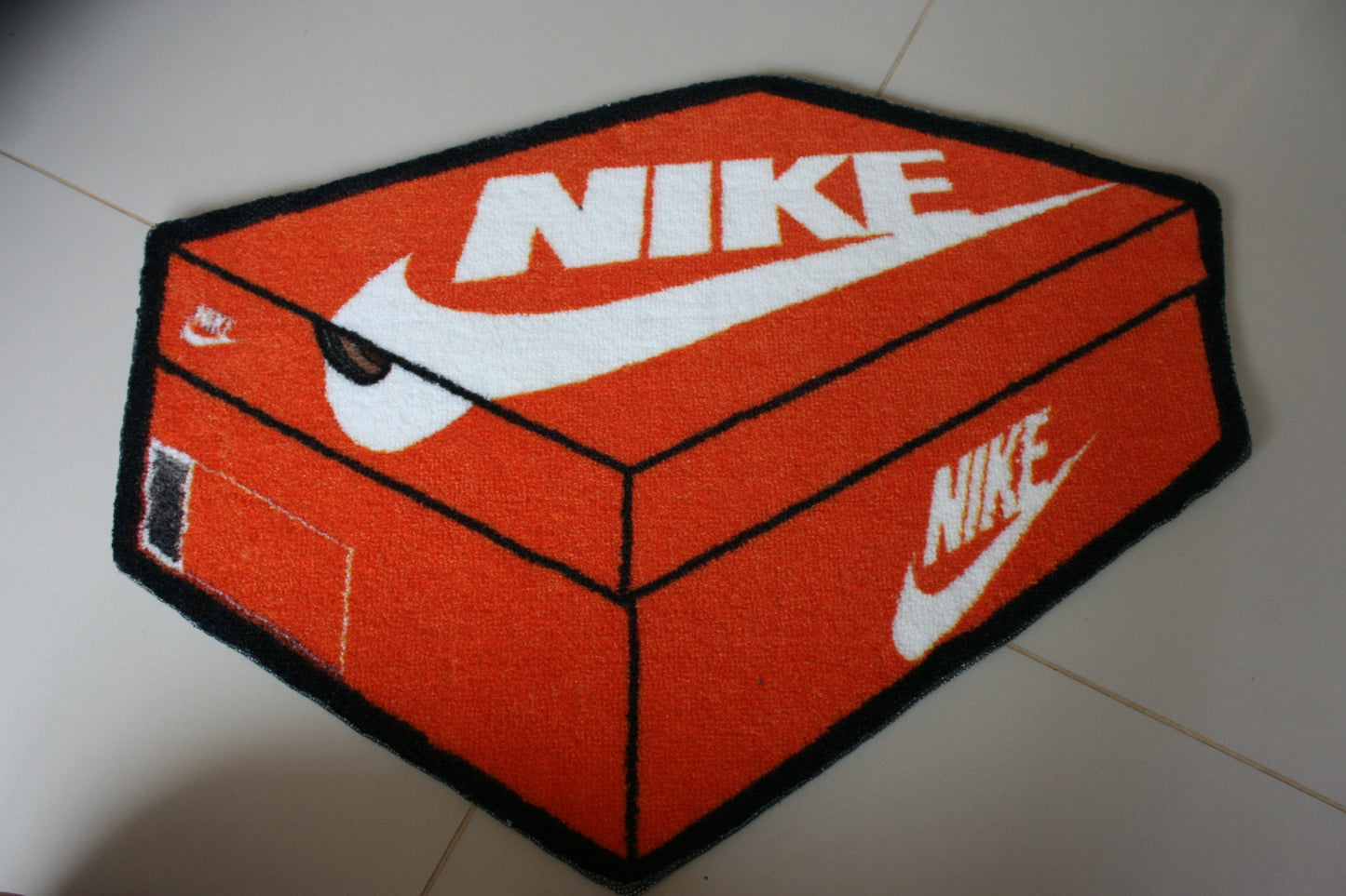 Tapete Caja Nike
